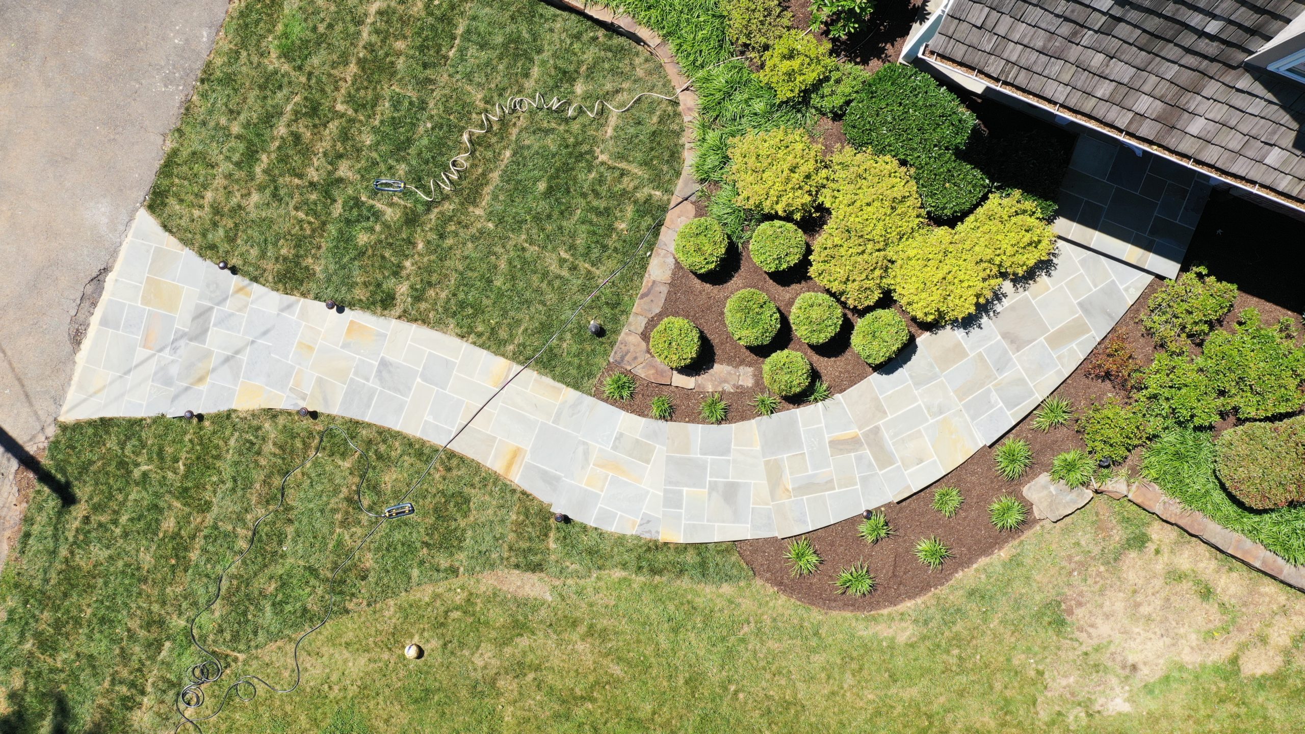 An aerial view of bushes and grass that was planted with our fertilization